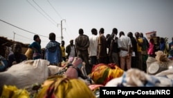 A group of newly displaced people who fled from Barsalogho following an armed attack, Jan. 21, 2020. 