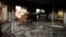 FILE - Glass, debris and overturned furniture are strewn inside a room in the gutted U.S. consulate in Benghazi, Libya, after an attack that killed four Americans, including Ambassador Chris Stevens, Sept. 12, 2012.
