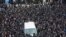 Thousands of ultra-Orthodox Jews participate in the funeral for prominent rabbi Meshulam Soloveitchik, in Jerusalem, Jan. 31, 2021.