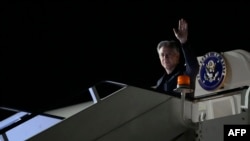 U.S. Secretary of State Antony Blinken, waves as he disembarks from his plane upon arrival, in London, Sept. 9, 2024.