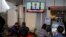 Maldivian watch a live telecast of statement delivered by outgoing President Yameen Abdul Gayoom at a cafe in Male, Sept. 24, 2018.