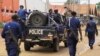 Congolese police move to quell protests in the eastern Congolese town of Beni, Dec. 28, 2018.