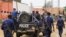 La police congolaise intervient pour réprimer les manifestations dans la ville de Beni, dans l'est du Congo, le 28 décembre 2018.