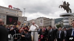 Pope Francis waves as he arrives to celebrate Mass in Macedonia Square, in Skopje, North Macedonia, May 7, 2019. 