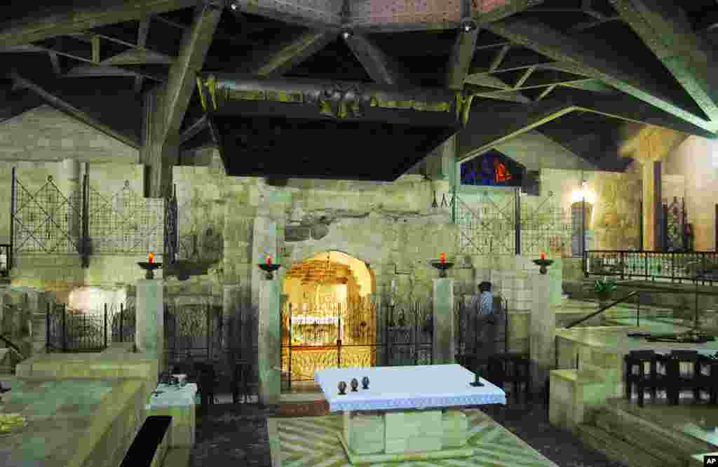 Inside the Basilica, visitors can see remains of a 5th century Byzantine-era church and a 12th century Crusader-era church. The Crusader church was never completed. (VOA - M. Lipin)