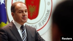 FILE - Kosovo's Foreign Minister Enver Hoxhaj speaks during a news conference, January 13, 2012.