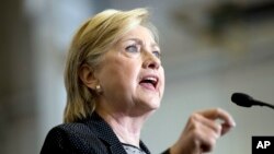 Democratic presidential candidate Hillary Clinton gives a speech on the economy after touring Futuramic Tool & Engineering, in Warren, Mich., Aug. 11, 2016.