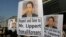 South Korean conservative activists hold portraits of U.S. Ambassador to South Korea Mark Lippert during a rally demanding his quick recovery near the U.S. embassy in Seoul, South Korea, March 6, 2015. 