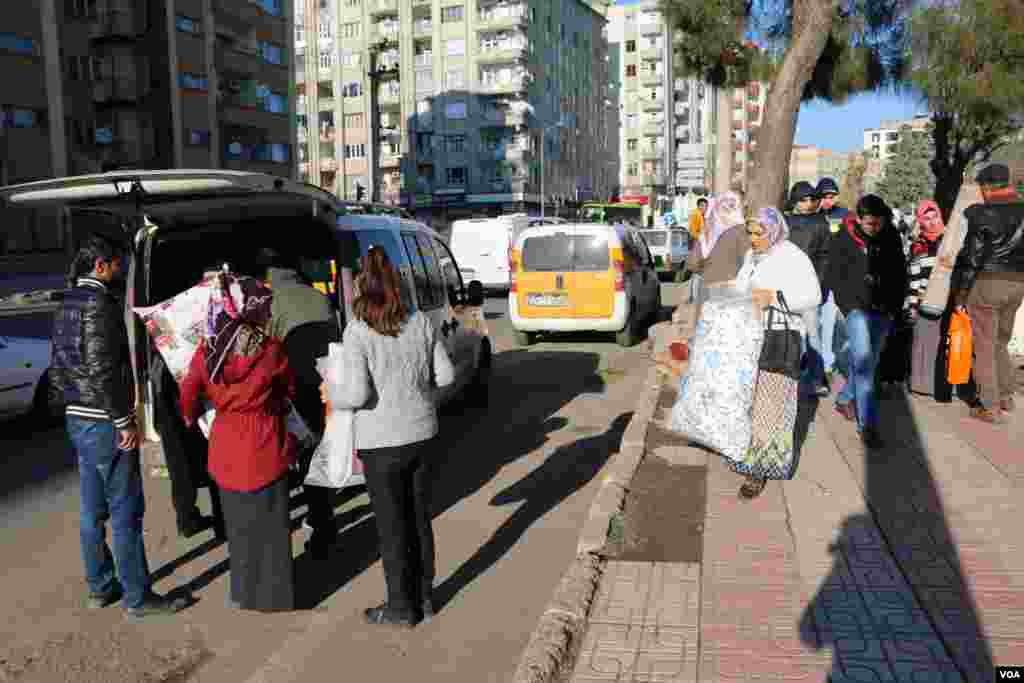 Residents living Sur district in Diyarbakir after the curfew was expanded