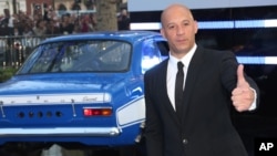 Aktor Vin Diesel tiba di pemutaran perdana film "Fast & Furious 6" di London. (Foto: Dok)