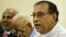 Sri Lanka's parliament speaker Karu Jayasuriya, at right, looks on at a meeting of MPs at the Parliament Building in Colombo, Nov. 2, 2018.