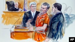 This artist rendering shows Irek Hamidullin, front center, his attorney Robert Wagner, front left, and interpreter Ihab Samra, front right, as judge Henry Hudson, left, listens in Federal Court in Richmond, Virginia, Nov. 7, 2014. 