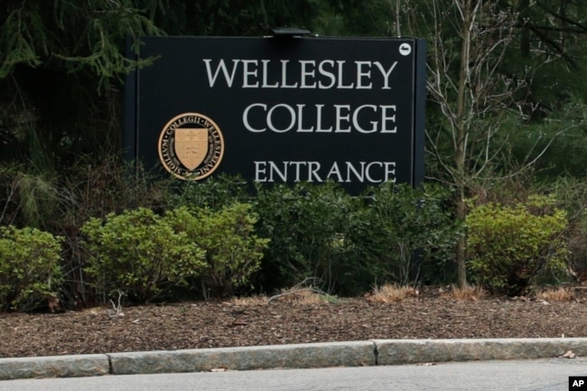 FILE - The entrance to Wellesley College in Wellesley, Mass., is pictured on April 20, 2020. The school is one of the most costly in the U.S. (AP Photo/Charles Krupa, File)