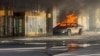 Flames rise from a Tesla Cybertruck after it exploded outside the Trump International Hotel Las Vegas, in Las Vegas, Nevada, Jan. 1, 2025 in this screengrab taken from a social media video. (Antunes via Reuters)