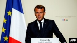 FILE - French President Emmanuel Macron at the Chateau of Chantilly, Aug. 22, 2019, near Paris.
