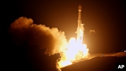 A SpaceX Falcon 9 rocket is launched from the Space Launch Complex-4 at Vandenberg Air Force Base, Calif., Oct. 9, 2017. On Oct. 11, SpaceX launched a rocket from Florida's Kennedy Space Center.