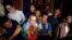 Members of the dissolved opposition Cambodia National Rescue Party (CNRP), pose for a picture after they were released from jail by King Norodom Sihamoni's pardon in Phnom Penh, Cambodia, Aug. 28, 2018. 