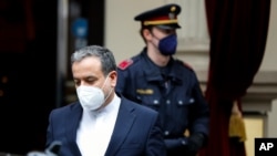 Iranian Deputy Foreign Minister Abbas Araghchi leaves the 'Grand Hotel Wien' where closed-door nuclear talks take place, in Vienna, Austria, May 25, 2021.