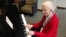 Cerlene Rose plays piano every Friday in the lobby of Sibley Hospital in Washington, D.C. (J. Taboh/VOA)