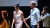 Britain's Prince Harry (2nd R), Duke of Sussex, and his wife Meghan Markle walk onto the stage for a family photo at the end of the "Afro women and power" forum, at the Municipal Theatre in Cali, Colombia, on August 18, 2024.