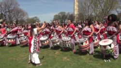 All Women Drum Troupe Lifts Audience's Spirit