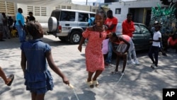 Children play at a shelter for families displaced by gang violence in Port-au-Prince, Haiti, on Wednesday, March 13, 2024.