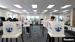 Voters cast ballots during a primary election and abortion referendum in Kansas City, Kansas, Aug. 2, 2022.