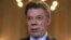 FILE - Colombia's President Juan Manuel Santos speaks during a Reuters interview at the presidential palace in Bogota, April 7, 2015. 