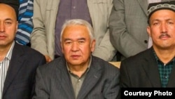 Nurmuhammad Tohti, sitting at a scholarly gathering in Urumqi, capital of Xinjiang, China. (Abduweli Ayup).