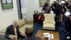 Supreme Court nominee Neil Gorsuch, left, meets with Sen. Chris Murphy, D-Conn., on Capitol Hill in Washington, Feb. 16, 2017.