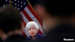 U.S. outgoing Federal Reserve Chair Janet Yellen holds a news conference after a two-day Federal Open Market Committee (FOMC) meeting in Washington, U.S. Dec. 13, 2017.