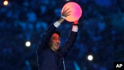 Rio Olympics Closing Ceremony: Japan's Prime Minister Shinzo Abe appears during the closing ceremony in the Maracana stadium at the 2016 Summer Olympics in Rio de Janeiro, Brazil, Sunday, Aug. 21, 2016.