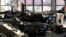 Refugees and migrants sleep inside a passenger terminal at the port of Piraeus, near Athens, Greece, Feb. 7, 2016. 