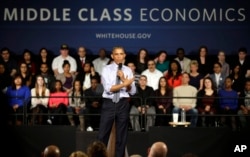 FILE - President Barack Obama speaks at a community college in 2015 when he was pushing to make the form of higher education cost-free. (AP Photo/Michael Conroy)