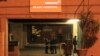 Police officers stand outside the main entrance of the Mediclinic Heart Hospital where former South African President Nelson Mandela is being treated in Pretoria, South Africa Sunday, Jun. 23, 2013. 