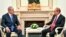 Russian President Vladimir Putin, right, speaks with Israeli Prime Minister Benjamin Netanyahu during their meeting at the Kremlin in Moscow, July 11, 2018.