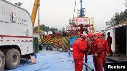 Employees work at a shale gas fracking site of Sinopec in Nanchuan, Chongqing, China March 18, 2018. 