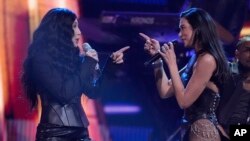 Cher, left, and Dua Lipa perform during the 39th Annual Rock & Roll Hall of Fame Induction Ceremony on Oct. 19, 2024, at Rocket Mortgage FieldHouse in Cleveland. 