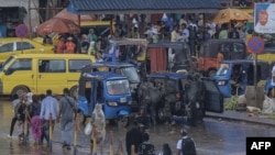 Democratic Republic of Congo soldiers get into a vehicle in Bukavu on Feb. 14, 2025. The city is descending into chaos as rebels advance and Congolese troops flee.