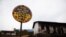 FILE - A bullet-riddled sign shown on Aug. 30, 2010, marks the entrance to Virunga National Park in eastern Congo.