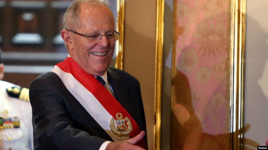 FILE - Peru's President Pedro Pablo Kuczynski attends the swearing-in ceremony of new Interior Minister Vicente Romero at the government palace in Lima, Peru, Dec. 27, 2017.