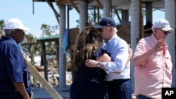 President Joe Biden hugs a person in Keaton Beach, Florida, during his tour of areas impacted by Hurricane Helene, Oct. 3, 2024. 