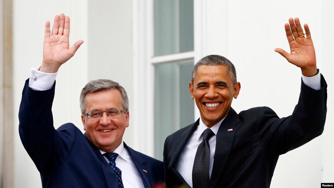 AQSh prezidenti Barak Obama Varshavada Polsha prezidenti Bronislav Komorovskiyning (chapda) mehmoni, 3 iyun, 2014-yil