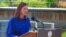 Michigan Gov. Gretchen Whitmer speaks at Rotary Park along the Grand River in Lansing, Mich., Aug. 23, 2021.