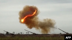 An image grab taken from a video made available on the official website of the Azerbaijani Defence Ministry on Sept. 28, 2020, allegedly shows Azeri artillery strike toward the positions of Armenian separatists in the breakaway region of Nagorno-Karabakh.