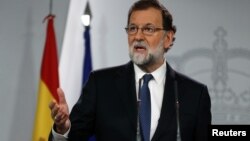 Thủ tướng Tây Ban Nha Rajoy tại họp báo hôm 21/10