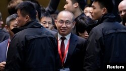 法國總統馬克龍訪華期間，在北京SOHO 3Q（共享辦公空間），SOHO中國公司董事長潘石屹參加法中人工智能論壇。 （2018年1月9日）。