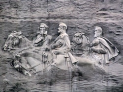 A rock carving in Stone Mountain, Georgia, depicts Confederate Robert E. Lee and Stonewall Jackson, two prominate generals, as well as Jeffereson Davis, the president of the Confederacy.