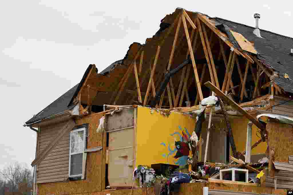 A bedroom is seen after a tornado ripped the roof and walls off from a home in Charlotte, North Carolina, March 3, 2012. (Reuters)