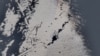Qatari LNG tanker Al Rekayyat stranded off the coast of Oman after a strike. European Union/Copernicus Sentinel-2/Handout via REUTERS 